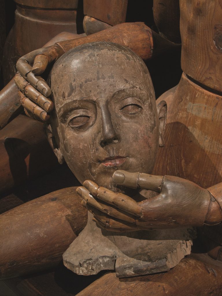 From her wooden sleep.